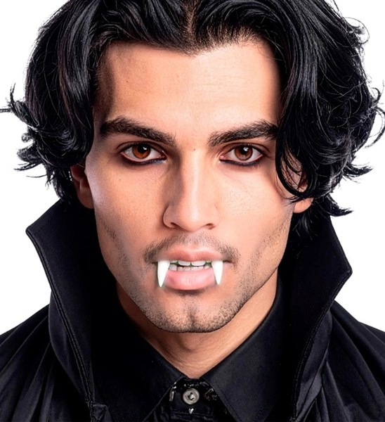 denti da vampiro fluorescenti