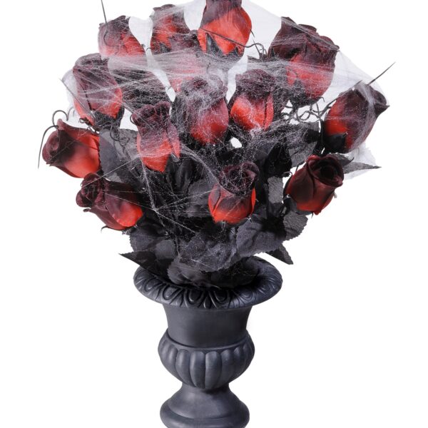 vaso con rose rosse e ragnatela