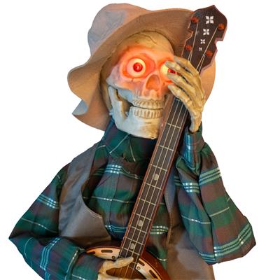 scenografia scheletro animato con banjo su cripta (copia)